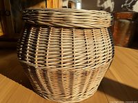 side view showing full shape and weave of wicker basket