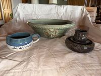 Group shot of all five pottery pieces