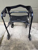 Top view of Invacare Rollite rollator showing seat, backrest, handles and wheels
