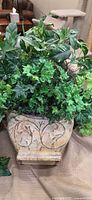 Square footed planter with silk foliage