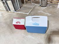 Both Igloo coolers side by side on floor