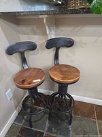Both bar stools under counter showing overall design