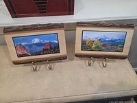 Both wood photo displays front view showing photos and hooks