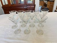 All 12 martini glasses front angled view