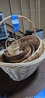 All six nested wicker baskets showing size comparison