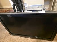 Front view of Sharp AQUOS TV showing screen and bezel