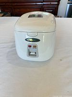 Front view of Zojirushi rice cooker showing indicator lights and lever
