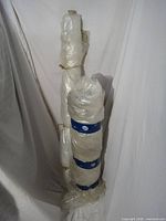 Both vapour barrier rolls standing upright, full view