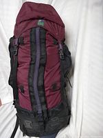 Front view of maroon and black Pine Ridge backpack showing main body and lid