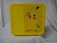 Front of yellow Crayola case with Pikachu graphic