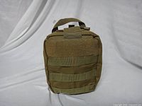 Front view showing MOLLE webbing and hook-and-loop field