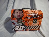 Front view showing Tony Stewart portrait, dual latches, number 20 graphics