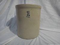 Front view showing entire crock and stamp