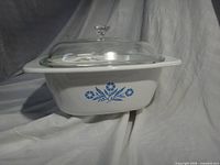 casserole front view showing blue cornflower graphic and lid