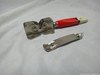 Knife sharpener and opener side by side showing overall design