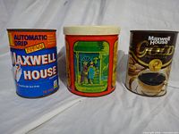 Front view of three vintage tins