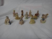 Full group of 12 Wade nursery rhyme figurines