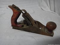 Right side profile of bench plane showing tote, iron assembly and knob