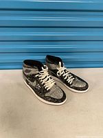 Full view of both sneakers side by side