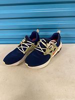 Both sneakers front three-quarter view showing overall design and lacing