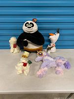 Group shot of all five plush toys