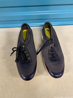 Top view of both shoes showing mesh uppers, laces and overall color