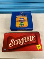 Scrabble and Golden Years game boxes closed