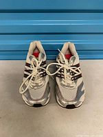 Front view of both sneakers showing overall design and condition