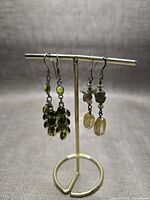 both earring pairs on stand, front view