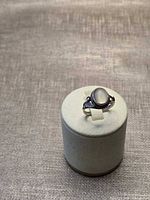 overall view of ring on display stand