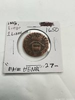 Obverse and holder showing 1650 Liard coin in 2x2 flip