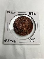 Obverse view of 1832 Brazil 10 Réis coin in cardboard flip