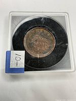 Coin in holder full view