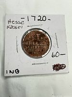 Obverse side of 1720 Hesse-Kassel 1 Heller copper coin in holder