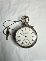 Front view showing H. Samuel Manchester dial with Roman numerals and seconds sub-dial