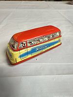 Angled view showing full bus graphics and colors