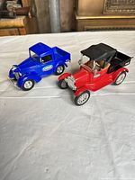 Both OSH die-cast trucks side by side