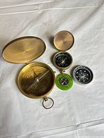 All four compasses front view