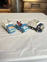 All three Tonka trucks side by side