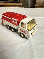 Left front view of Tonka TWA tanker truck