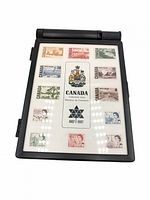 Front view of display case showing full stamp set around coat of arms