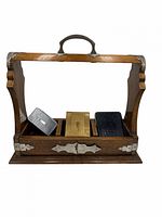 Wooden tantalus with three cases inside, front view