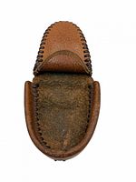 Pouch open showing interior suede and whipstitch edging