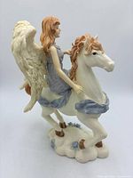 Left front profile of Seraphim Classics "Carefree Spring" sculpture