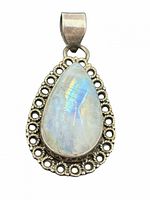 front view of moonstone pendant showing stone and bezel
