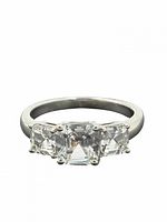 Front view of ring showing three asscher-cut stones