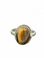 Front view of sterling silver ring with oval tiger's eye stone