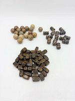 All three bead styles grouped: round beige, rectangular brown, triple-ridge brown