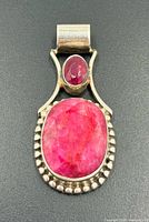 Front view showing pendant design and stones