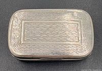 Top view showing embossed wave pattern